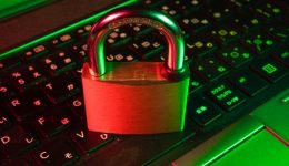 cyber security padlock sat on keyboard