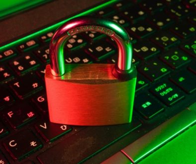 cyber security padlock sat on keyboard